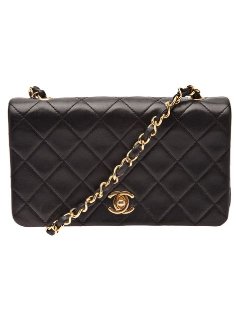 chanel vintage quilted cc backpack|Chanel white classic flap bag.